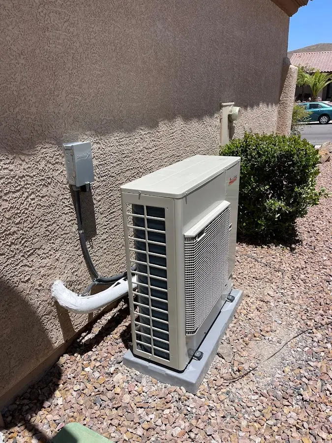 Residential air conditioning condenser unit in Manchester